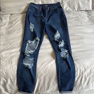 Distressed Blue Jeans